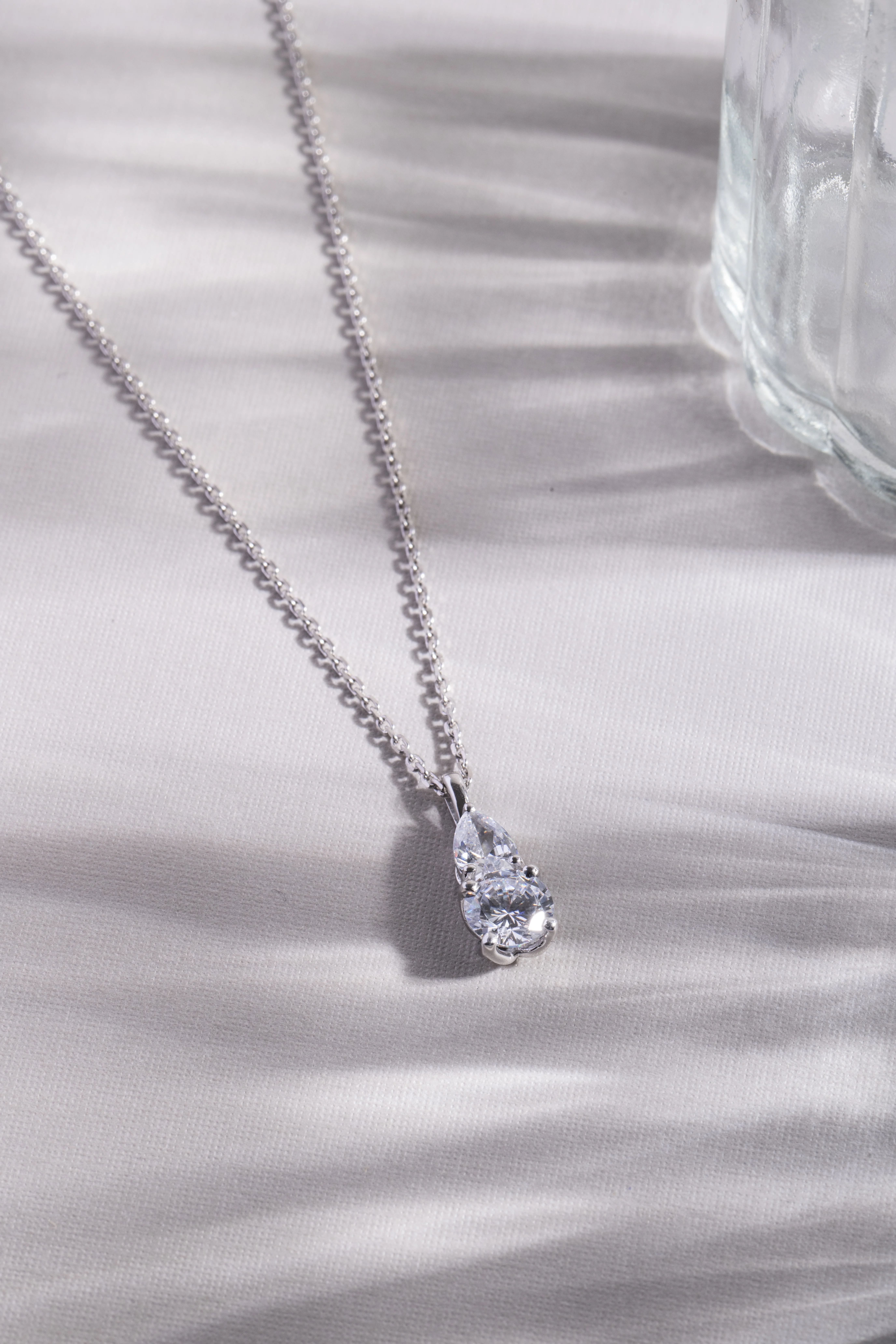 Dual Beauty of Oval & Round Diamonds Pendant